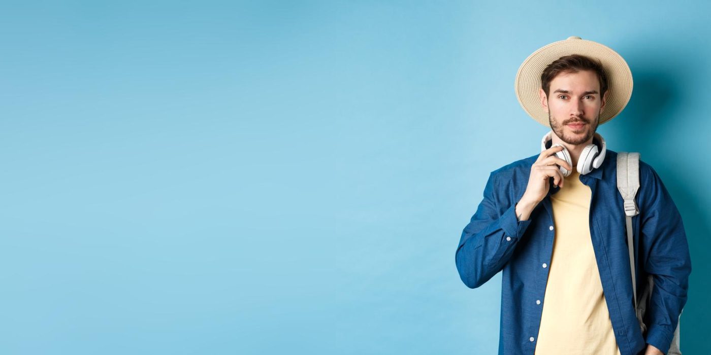 portrait-woman-standing-against-blue-background_1048944-18033424